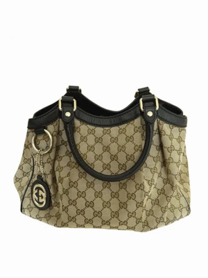 Gucci Sukey Tote Väska (Vintage) - **äkthetsgaranti, kontakta mig för info** Riktigt klassisk och fin vintageväska som rymmer en del. Dustbag från gucci samt lite tillbehör medföljer.  För fler foton och info på denna väska samt andra väskor ur min lyxkollektion —> pretti.se