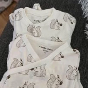Baby pyjamas och body från ellos - Aldrig använda 