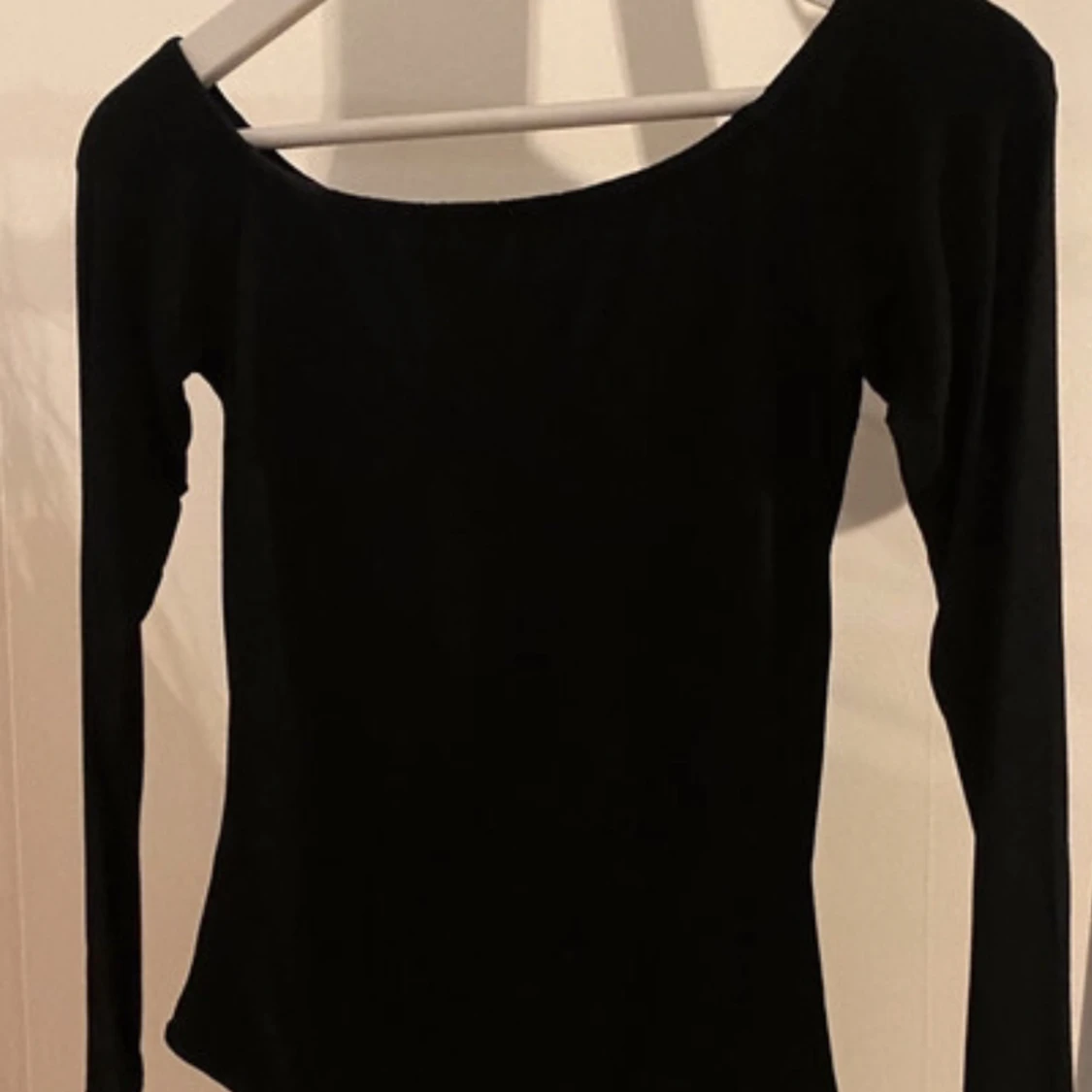 Svart långärmad body