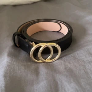 Bälte - Ett svart bälte i bra skick