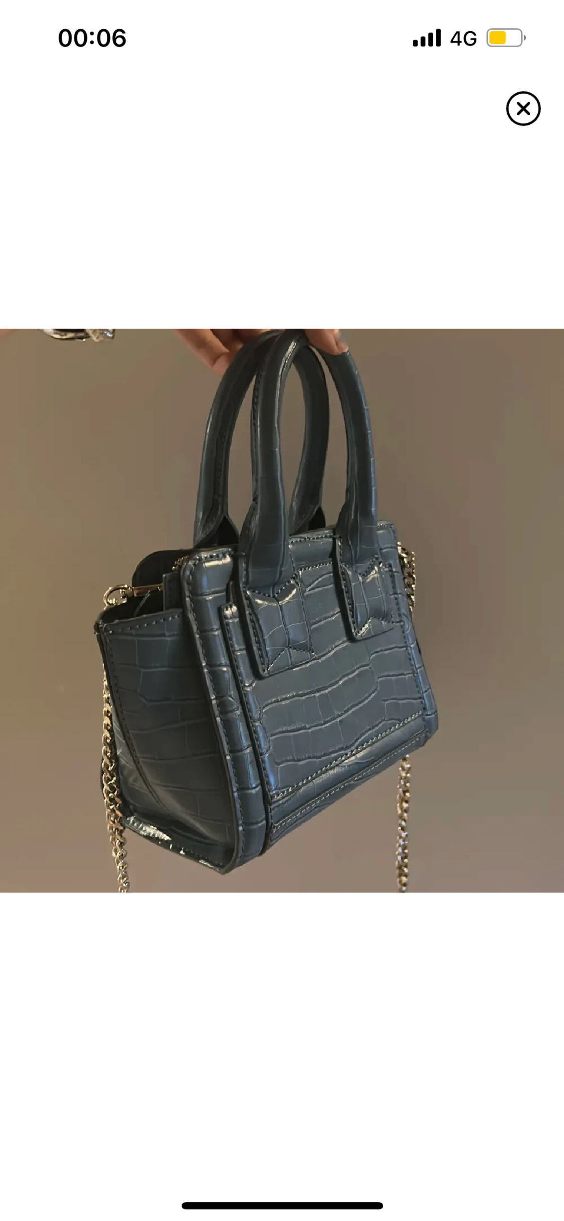 Blå väska köpt på plick