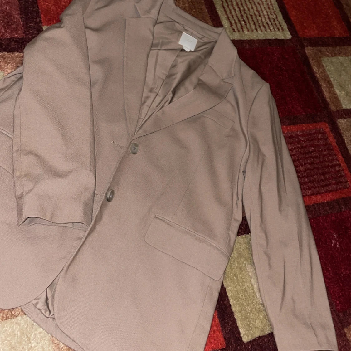 En oversized kavaj i nyskick  - 90