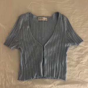 Blå topp - Skriv för bilder på