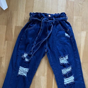 medium wash jeans  - Medium wash jeans tie on the waste 