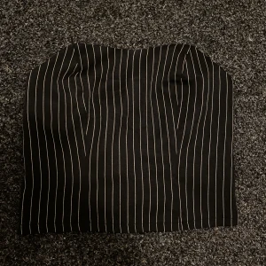 Randig tubtopp - Randig tubtobb med dragkedja på baksidan. Aldrig använd