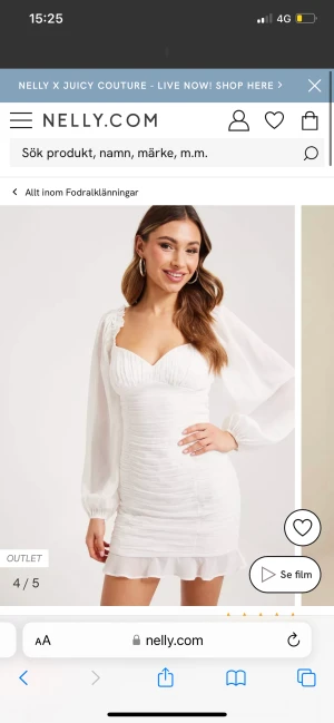 Student klänning vit  - En snygg student klänning vit från Nelly. Använd 1 gång, inga fläckar 