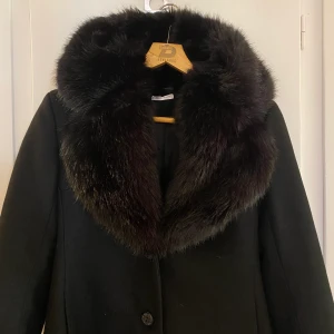Kappa  - Snygg kappa 38 från Ida Sjöstedt  Nyskick  Mycket mysig och varm i vinter