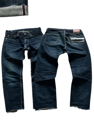 Blåa Rare Selvedge Japan Momotaro Jeans  Straight fit Storlek W30 - Fina Momotaro Jeans i blå färg. | Jeansen är i mycket bra skick och sparsamt använda. |  Äkta som allt annat jag säljer! ✅ |  Storlek: W30 L30 | Skick: Mycket Bra Skick - Har blivit avklippta vid benen (SE SISTA BILD)   | Färg: Blå | Märke: Momotaro | Modell: Jeans |   Hör gärna av dig vid frågor så svarar jag så fort jag kan! 😁 |  (SKU - 164)