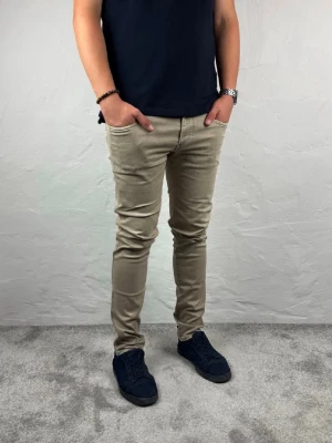 Replay jeans  - Ett par riktigt snygga jeans från Replay i storlek W32 L32 i modellen Anbbas Hyperflex 