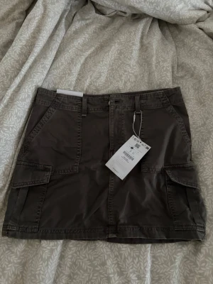 minikjol  - minikjol från bershka, prislapp kvar, grå/grön färg