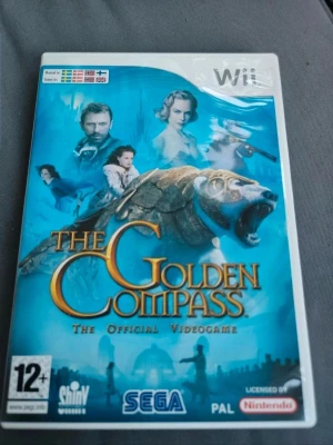 The Golden Compass till Nintendo Wii - The Golden Compass är ett actionäventyrsspel till Nintendo Wii, baserat på filmen med samma namn. Omslaget är blått med filmkaraktärer och en bepansrad björn. Spelet är PAL-version och rekommenderas från 12 år. Perfekt för dig som gillar fantasy och äventyr.