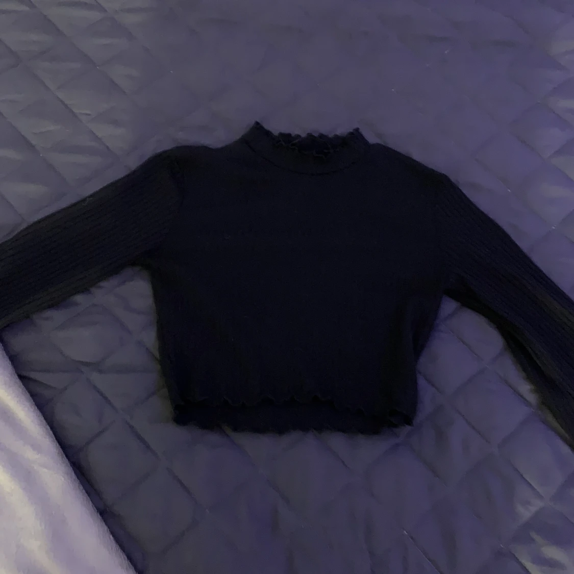 Kort polo med utsvängda armar