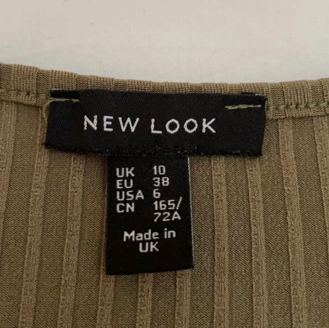 Bodysuit från New look med knytning  - 91