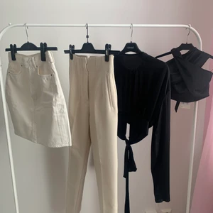 Oanvänt - 150kr för varje plagg  - -Vit kjol från H&M, storlek 34 - Begie kostymbyxa från Zara, storlek XS - Svart satin blus med öppen rygg från Nakd, storlek 34 - Svart topp med knut runt hals från Bikbok, storlek XS 