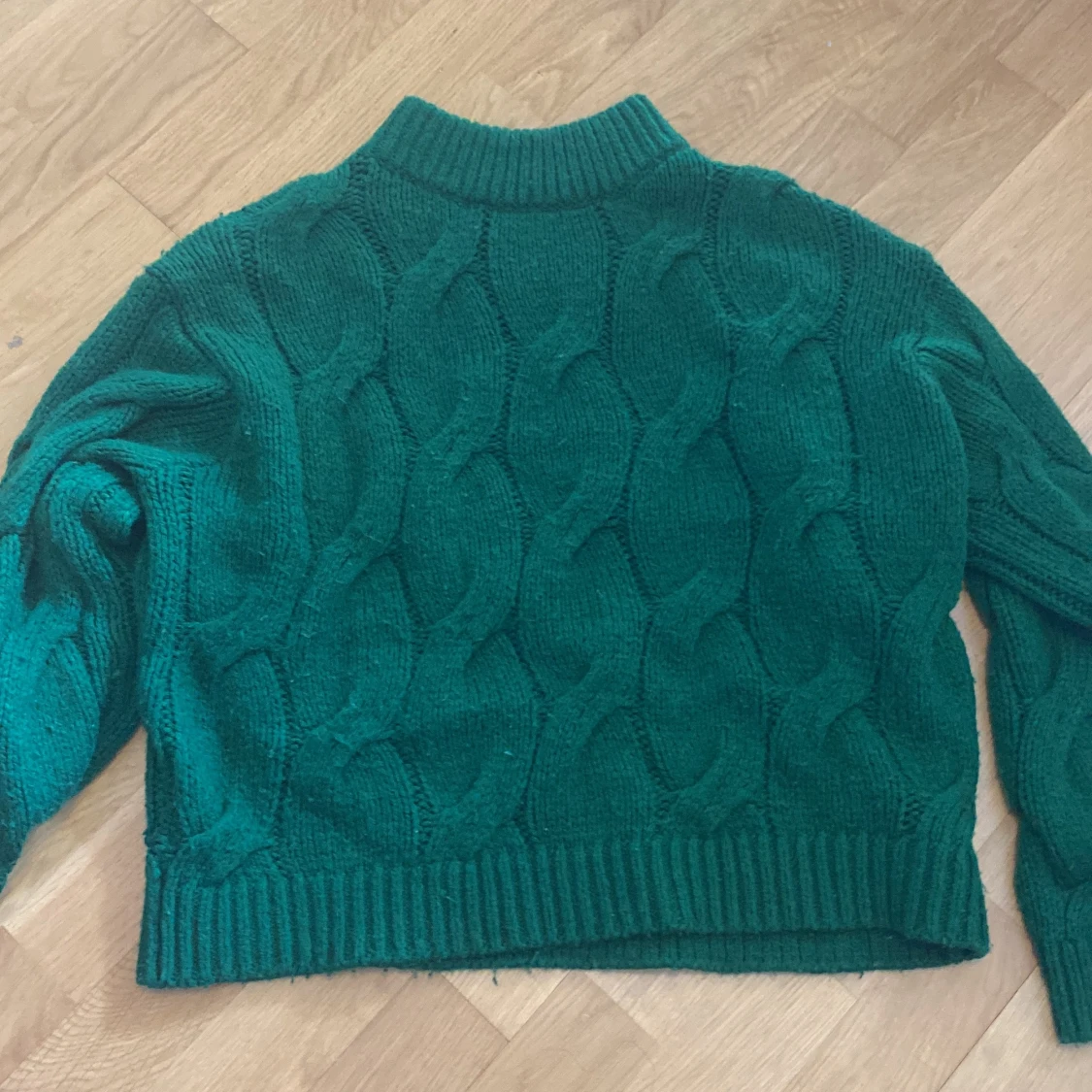 Grön stickad tröja