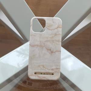 Ett vitt marmor ideal of sweden skal som passar mobilen iPhone 12 och iPhone 12 pro🥰