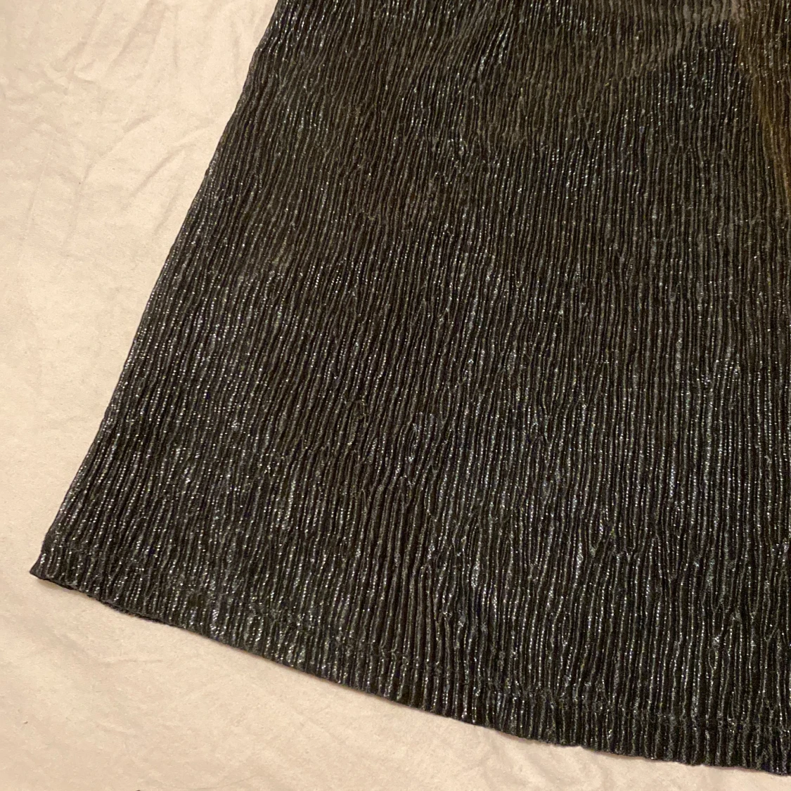 Glittrig svart topp - 90