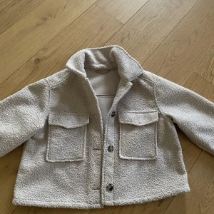 Kort kappa  - Ny utan prislapp 