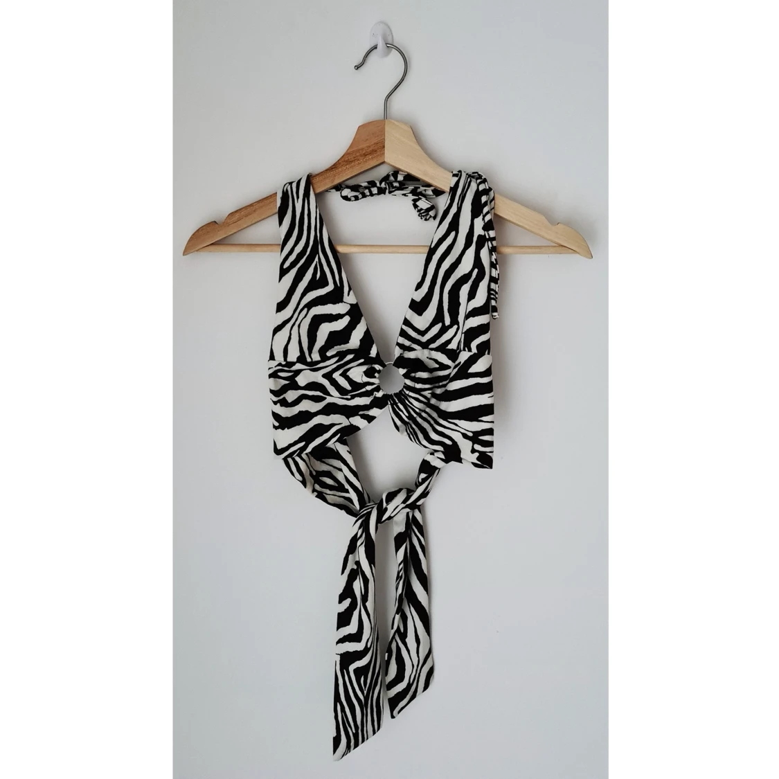 Topp med ringdetalj: storlek S - 90