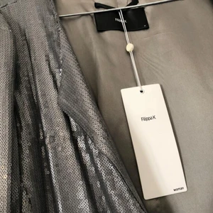 Flippa k - Flippa k womens outwear tag is still on.