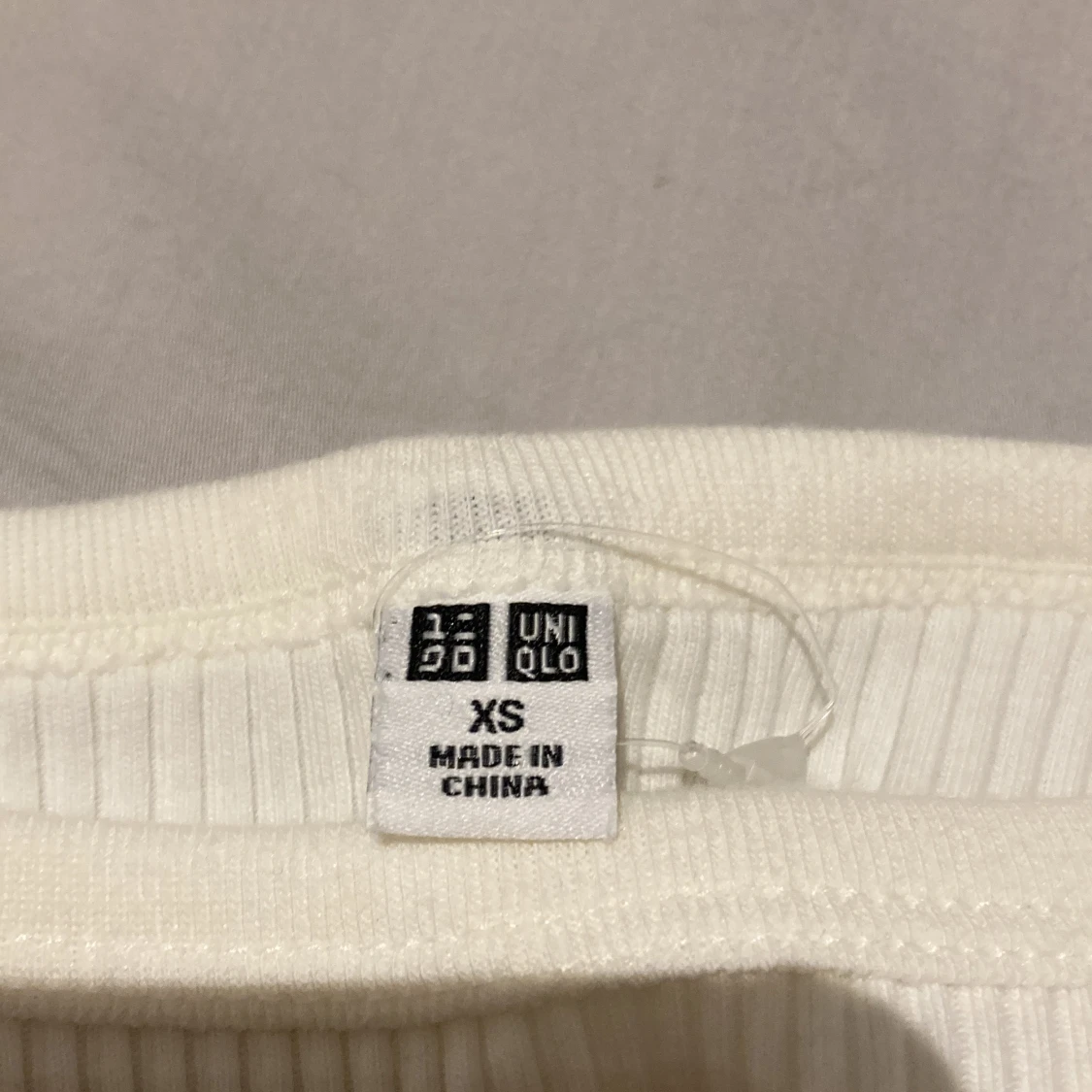 Uniqlo White Tank Top  - 91
