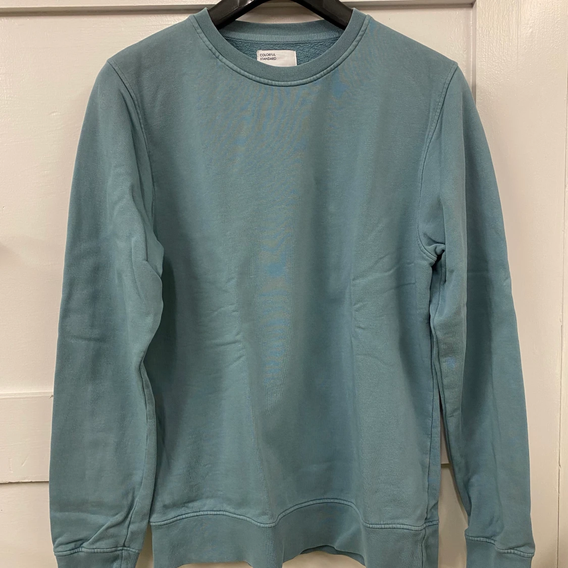 Ljusblå tjocktröja