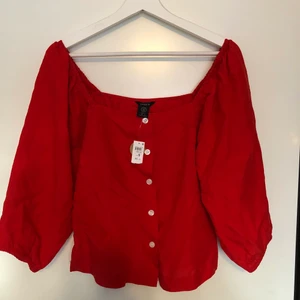 Röd topp Oanvänd.  - Röd topp helt oanvänd. 