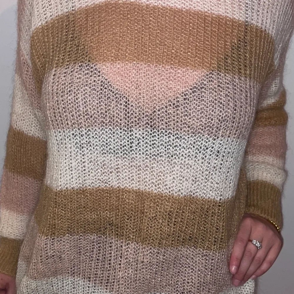 Wool sweater from GANNI. Great condition, barely used. One-size fits all. Model on picture is a size S and is a loose fit on her. Shipping included in price.. Stickat.
