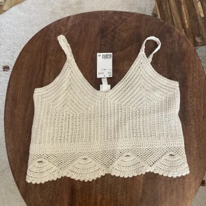 Virkad topp storlek M  - Fin virkad topp. Aldrig använd. 