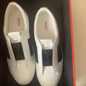 Sneakers - slip ons, hugo boss, nypris 2000kr, nyskick   säljer för 1000