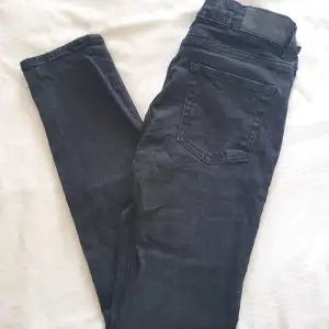 Svarta slim jeans, unisex