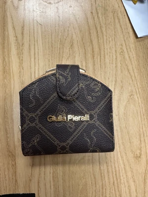 plånbokthis is totally new and unused  - this bag is totally new and unused. height 10cm length 10.5 cm