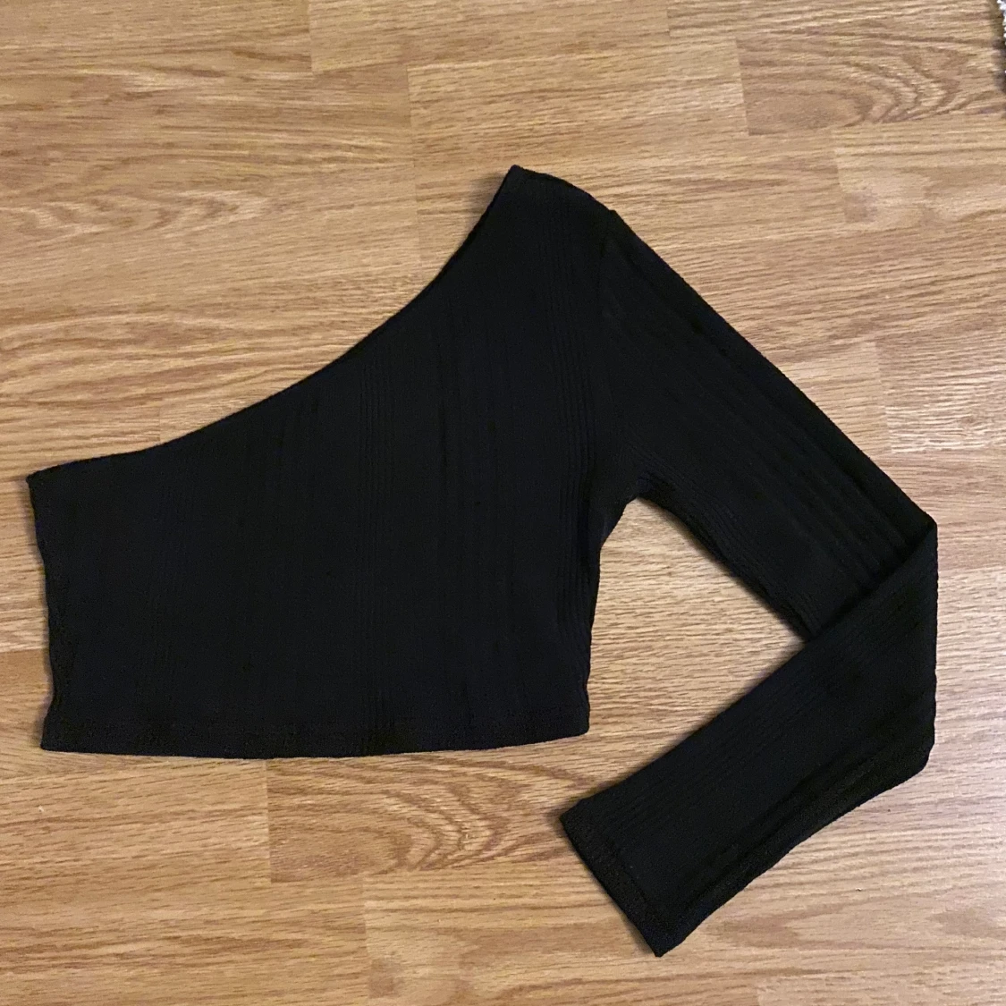 svart topp i strl 34