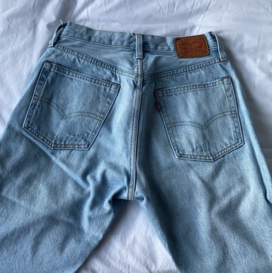 Ljusblåa levis jeans 