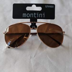 Helt nya solglasögon av varumärke Montini. 