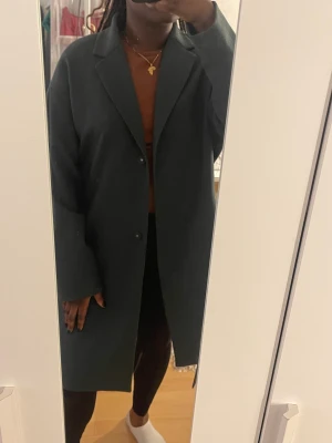 Kapp - Kappa i storlek L från Lindex 