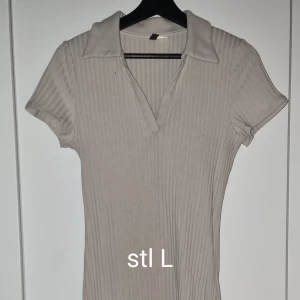 Klänning - Fin pikeklänning. Skulle säga att den även passar en i stl M