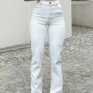 These white flare jeans are from Emmiol, and they are barely used. Very good quality, and very cute!