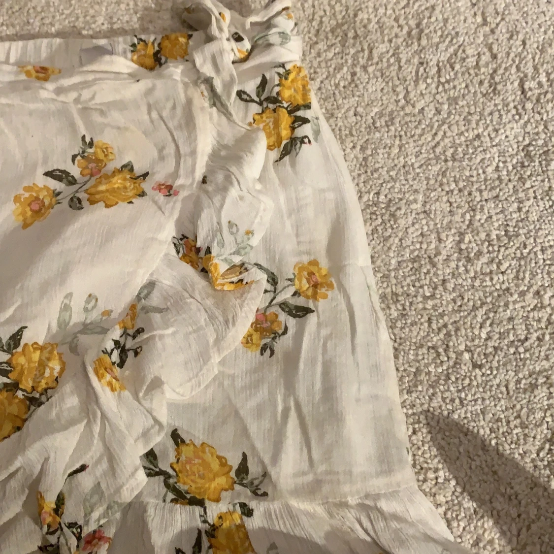 En blommig kjol. - 91