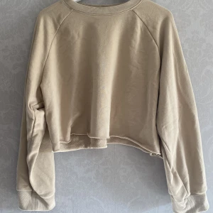Tjocktröja  - Beige tjocktröja  Storlek: Medium 