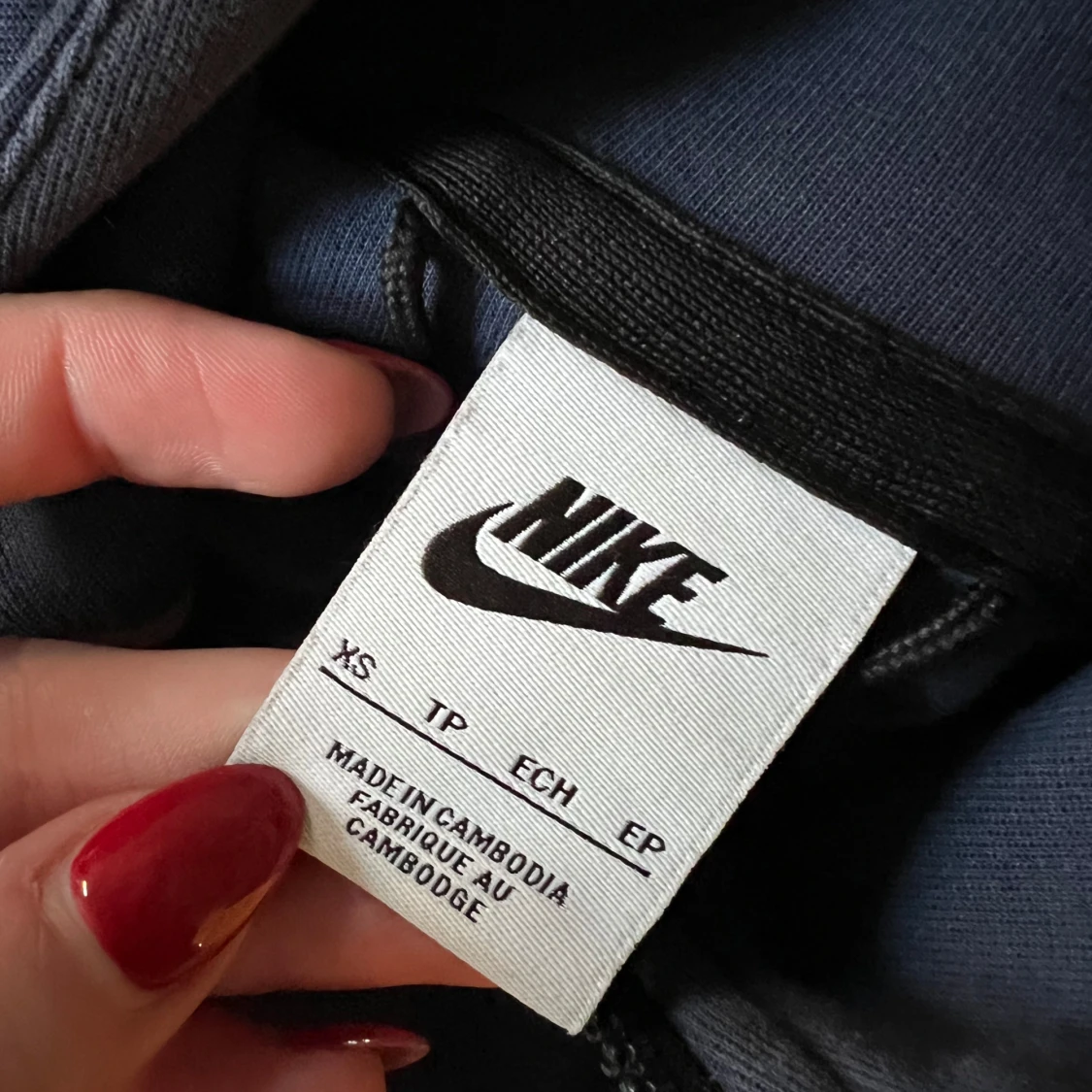 Mörkblå hoodie från Nike - 92