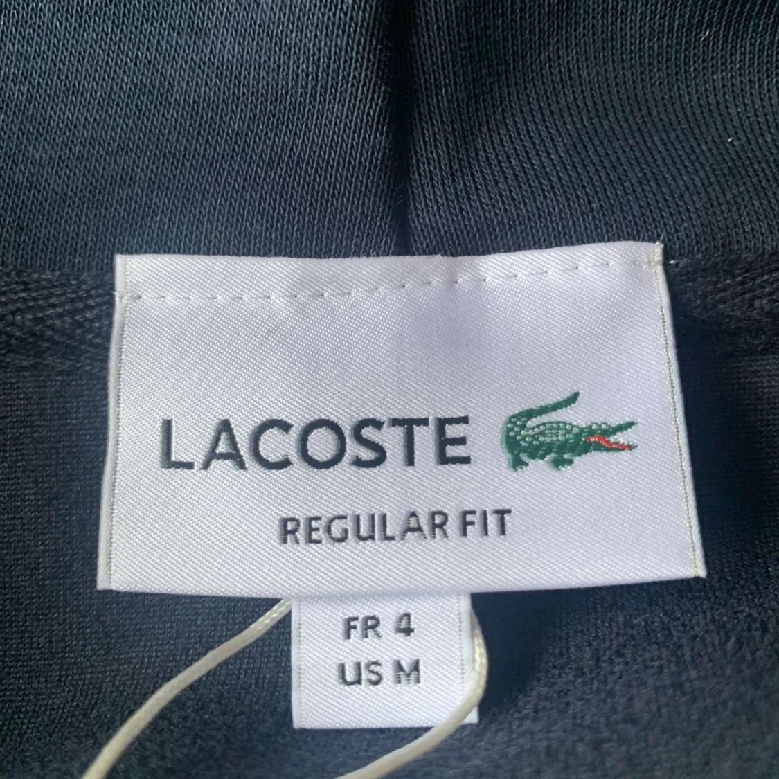 Mörkblå hoodie från Lacoste - 1