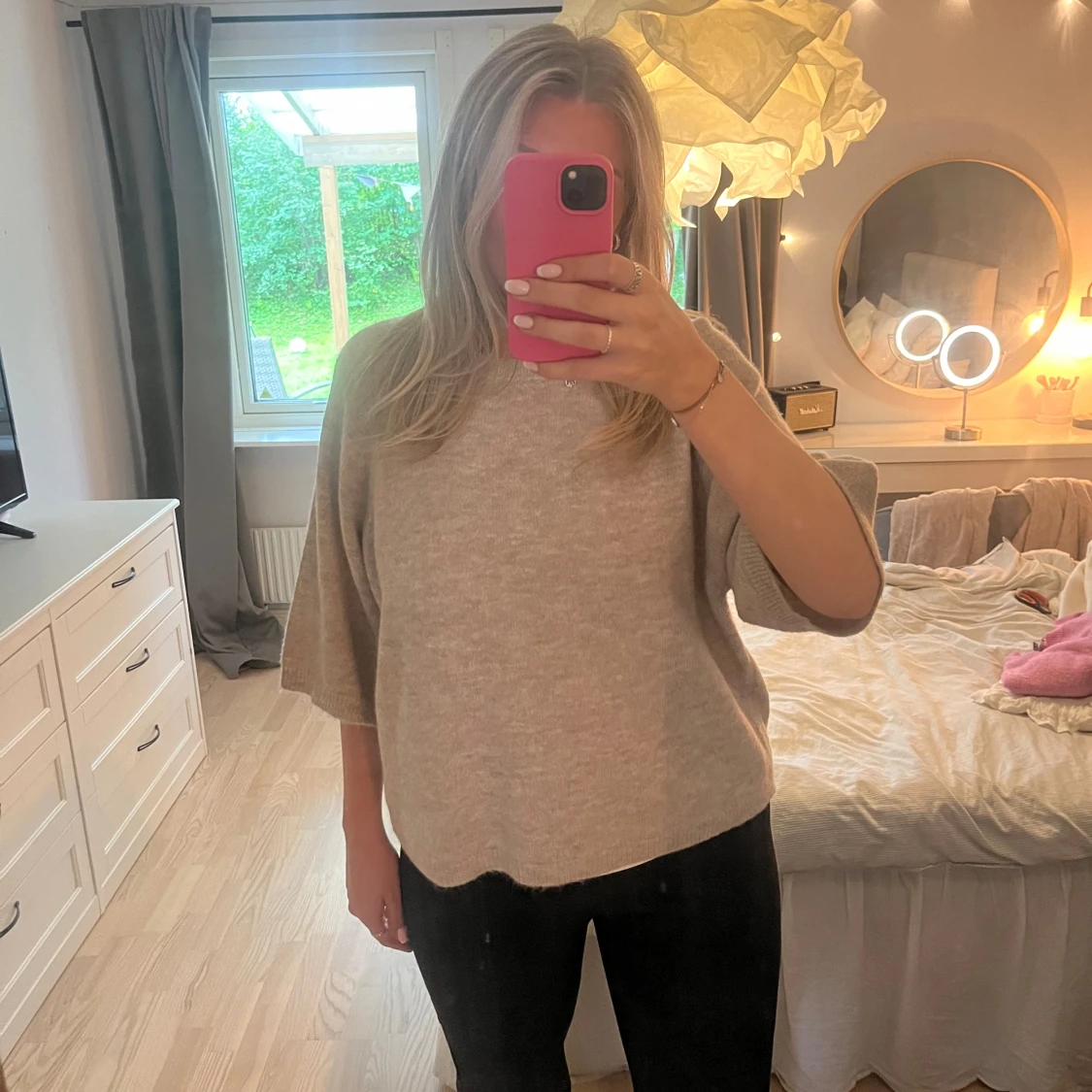 Stickad kortärmad tröja