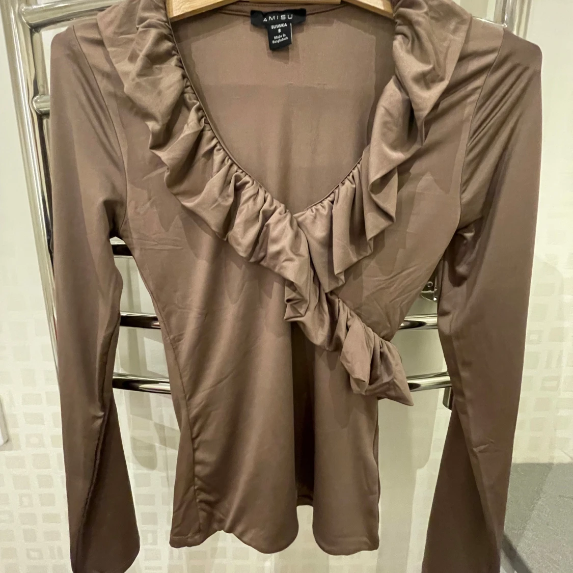 Brun långärmad topp från Amisu