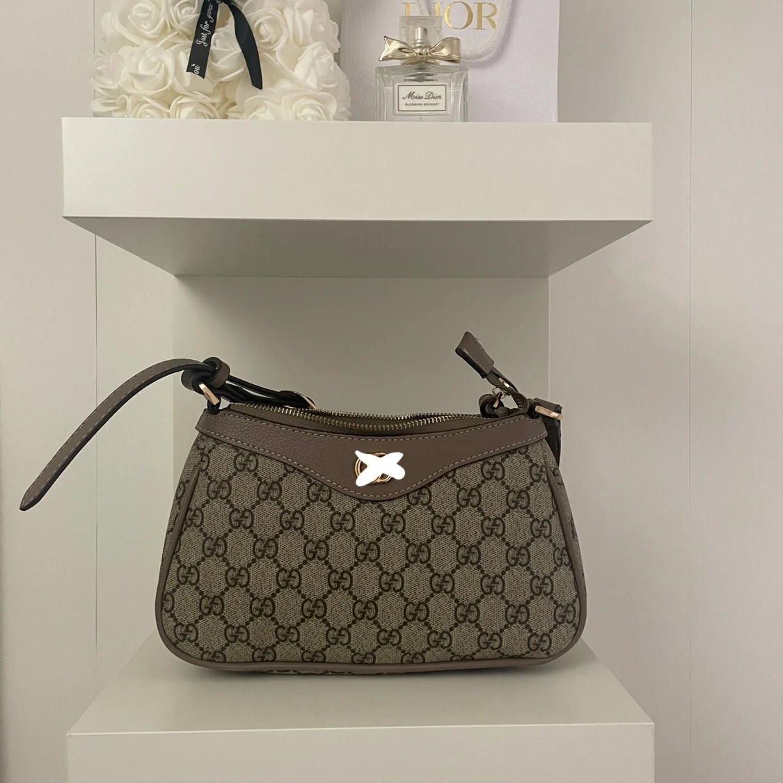 Mönstrad axelväska med dragkedja