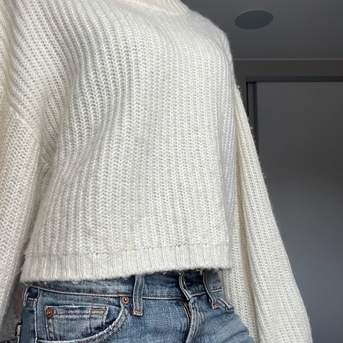 Vit stickad tröja