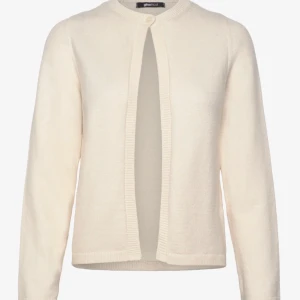 Vit kofta från Gina Tricot - Säljer en superfin vit/beige kofta från Gina Tricot. Den är i bra skick och använd endast 1 gång. Koftan har en knapp framtill och är långärmad med ribbade kanter. Perfekt till hösten.