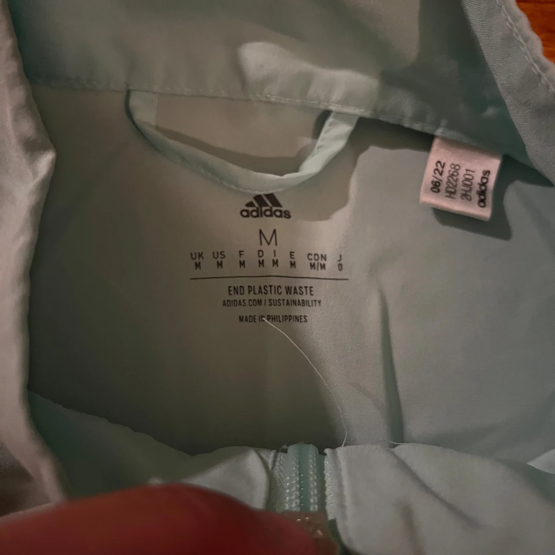 Ljusblå vindjacka från Adidas - 90