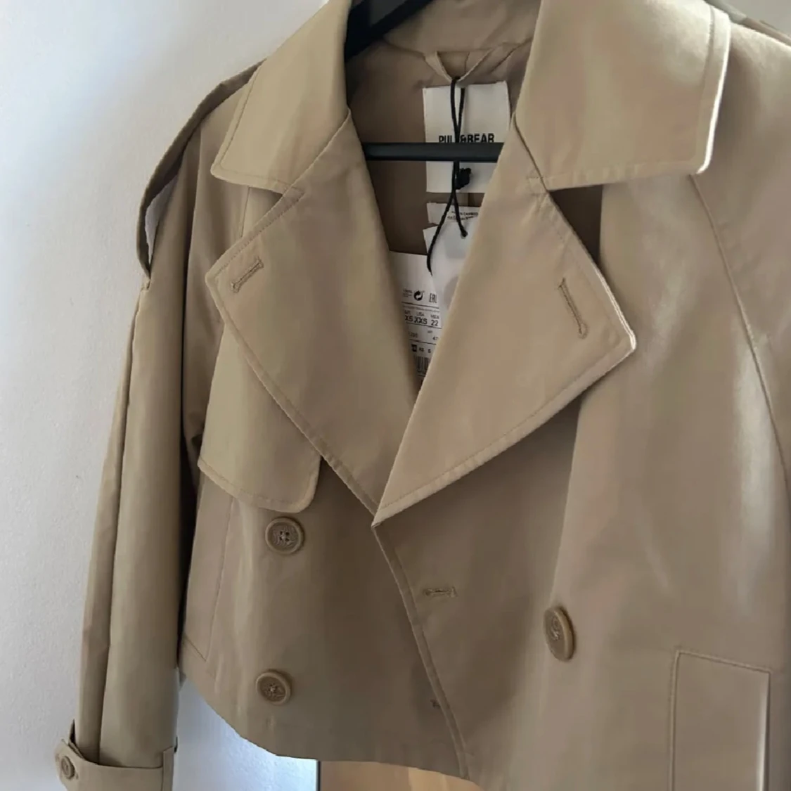 beige trench coat - 90