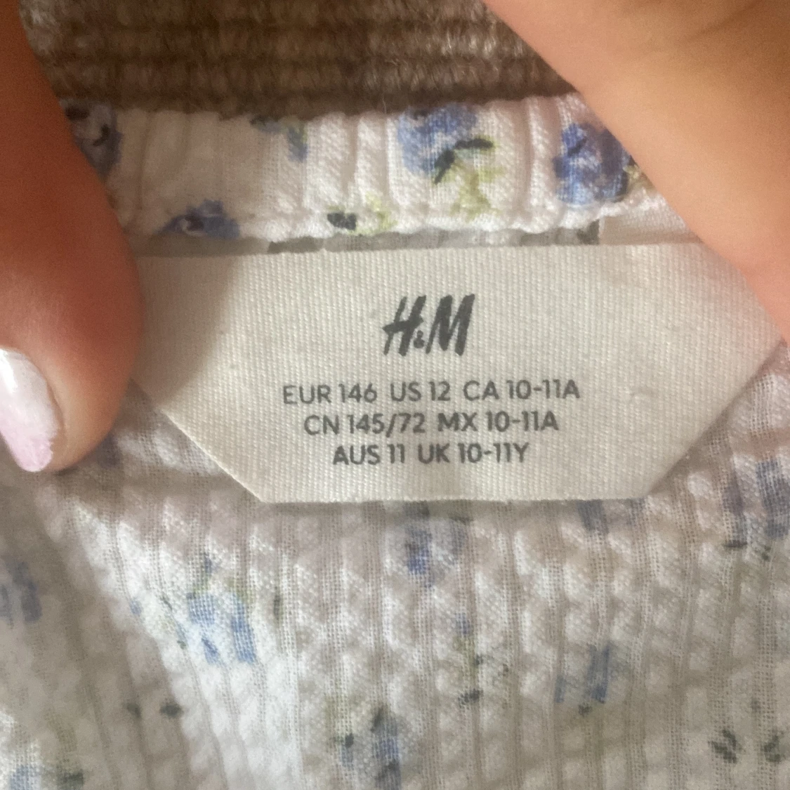 Blommig tupe topp - 90